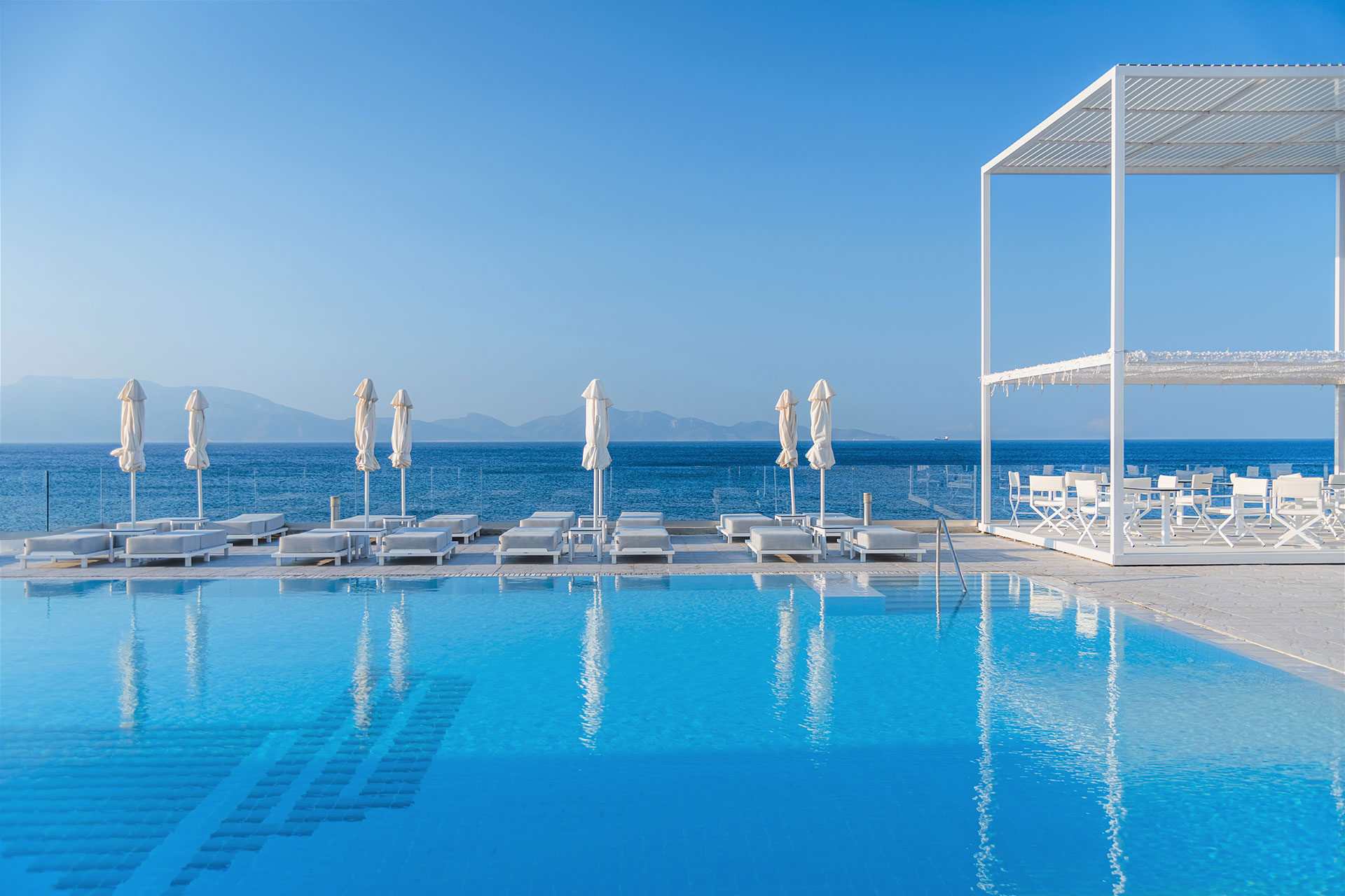 
Pool area with sunbeds
