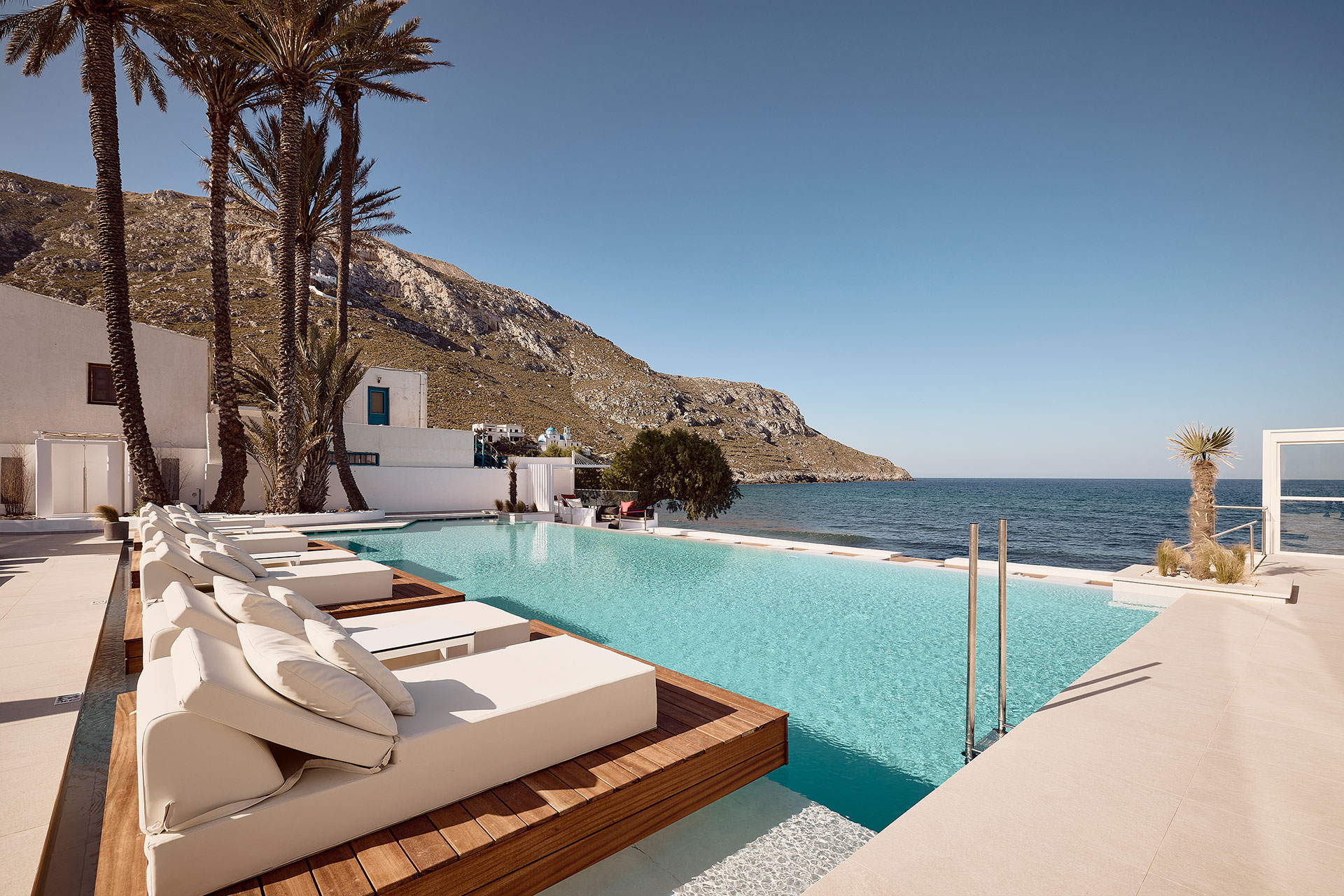 
Side view of the pool and the sunbeds
