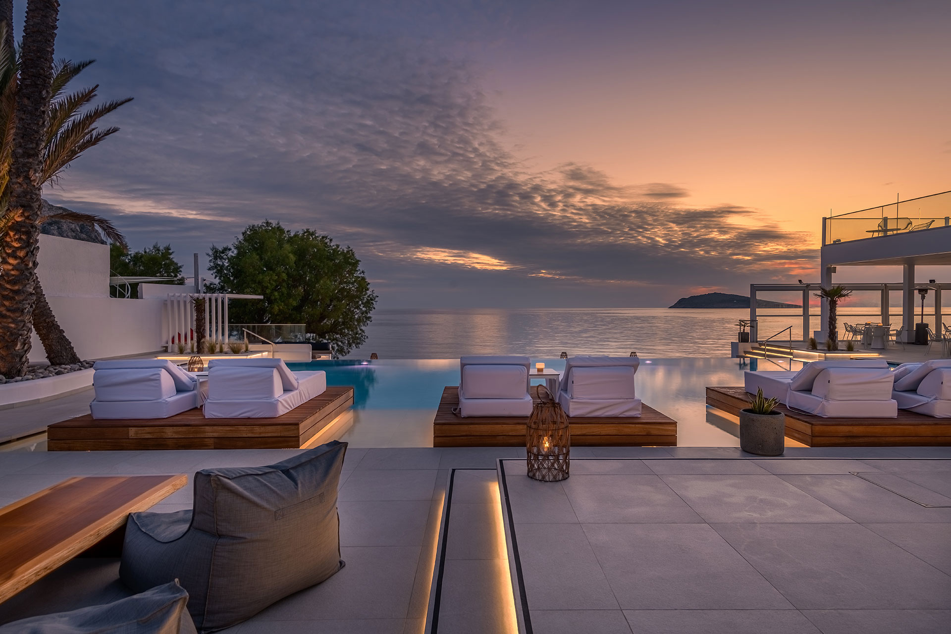 
Sunset view of the pool and sunbeds